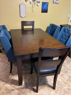 Dark Wood table with 6 chairs