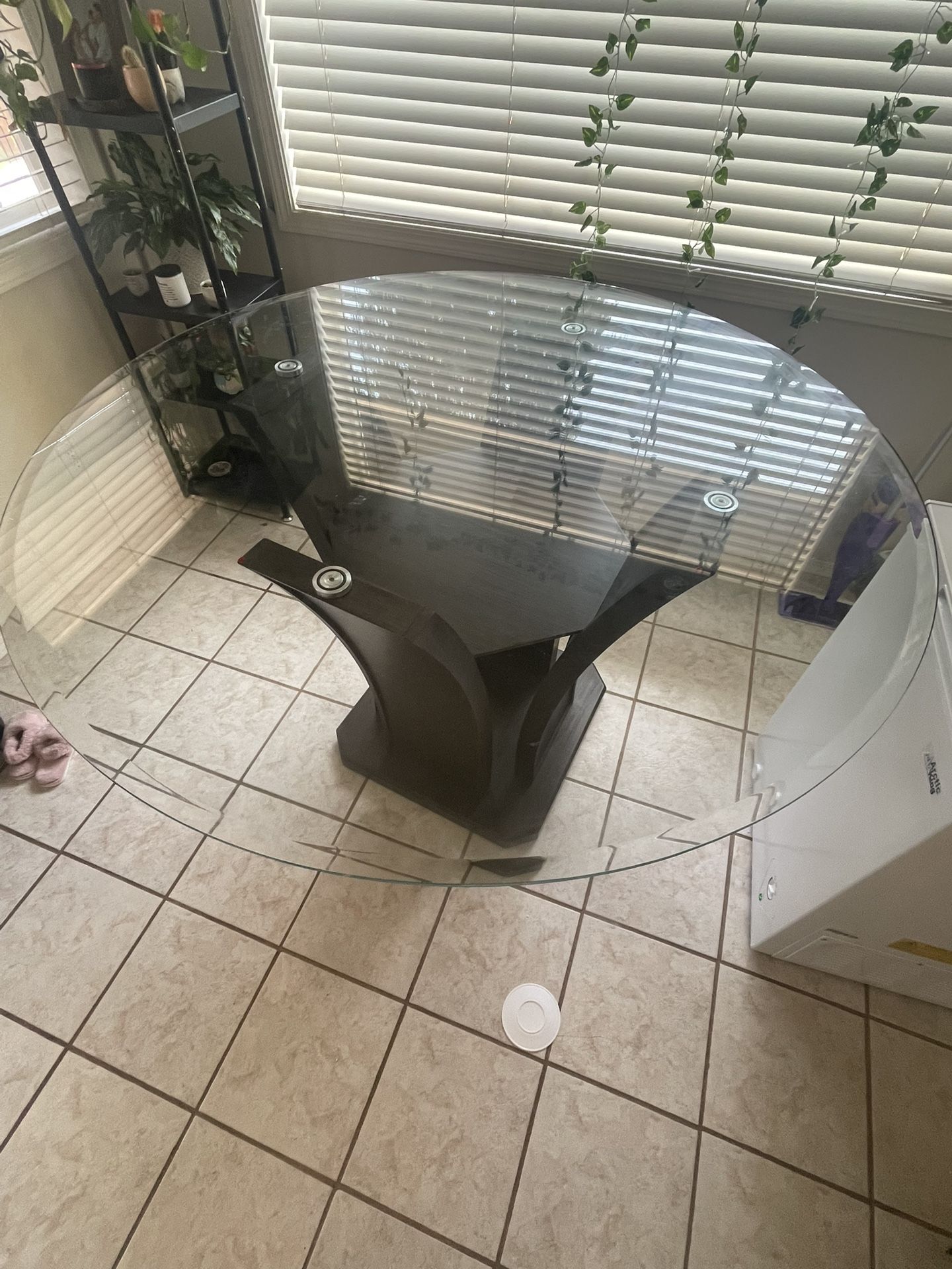 Bar stool height table with glass top