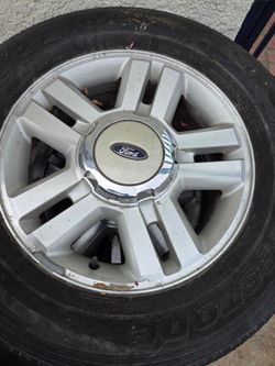 Ford f 150 2004 rims tiers lugs and caps