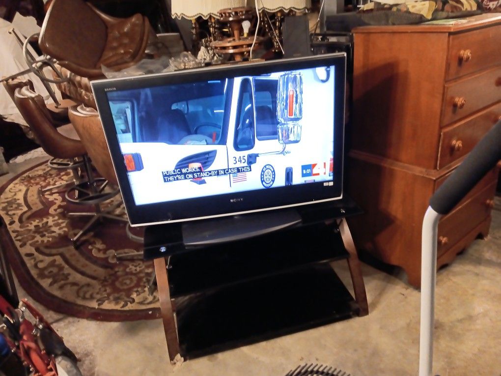 42 Inch Sony With TV Stan And Remote For Salle