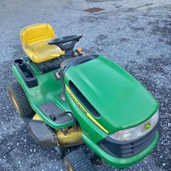 John Deere riding lawn tractor mower