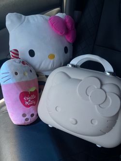 *Hello kitty plushies and travel bag*