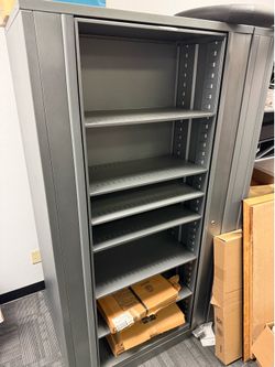 Rotary action double sided medical file cabinet
