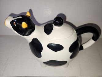 Decrative Piture water jug cow $5 LOOK AT PICTURES