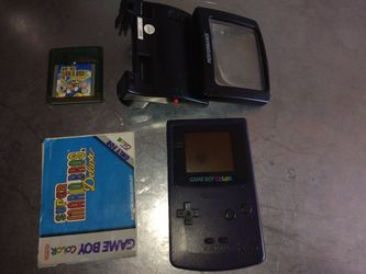 Nintendo game boy color with super Mario Bros deluxe game