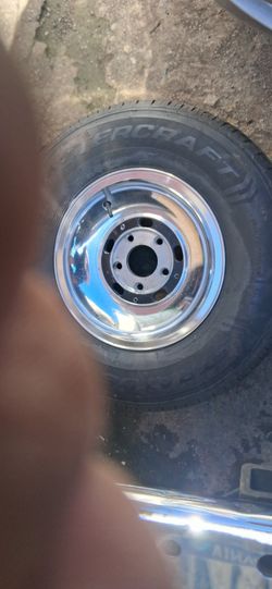 Used 225/75R15 Tire on Chrome Rim