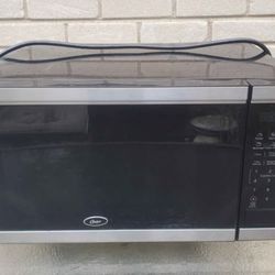 1.1  Cubic ft  Oster Microwave 
