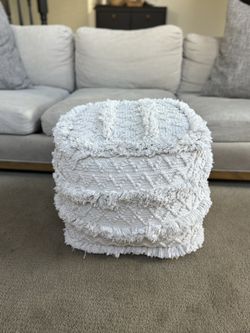 Ivory color knit Pouf Ottoman 18x18 Inches.  19 inches tall. Machine washable.