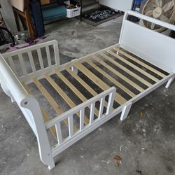 Delta Children's Wood Sleigh Toddler Bed