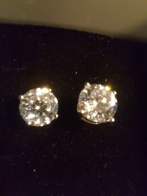 New 4-Prong Simulated Diamond Earrings.   Three ctw, Sterling Silver With Platnum Overlay. 