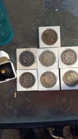 Silver coins and small gold coin