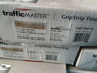 Traffic master grip strip flooring- khaki oak