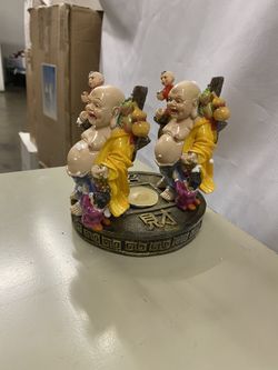 Double Buddha with Candle