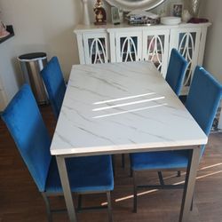 Table And 4 Chairs 