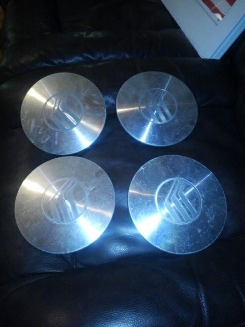 REDUCED.....Mercury Center Caps