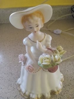 Beautiful woman night light, holding a basket of flowers.Excelent shape. 