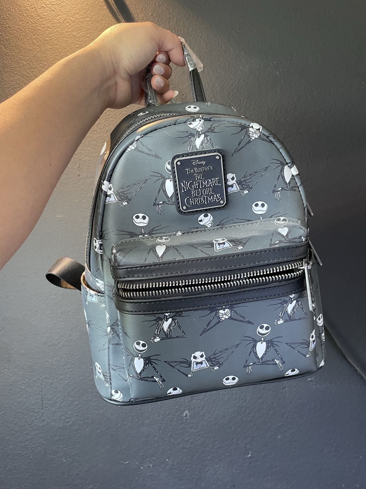 JACK SKELLINGTON POSES LOUNGEFLY MINI BACK PACK