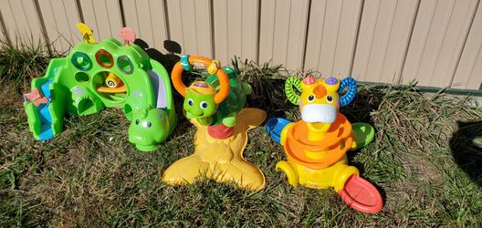 V tech turtle and 2 FisherPrice toys