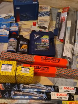 Variety Of Car Parts And Fluids