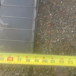 small dog crate has bottom liner 