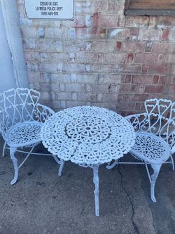 White iron garden patio set table and chairs heart back