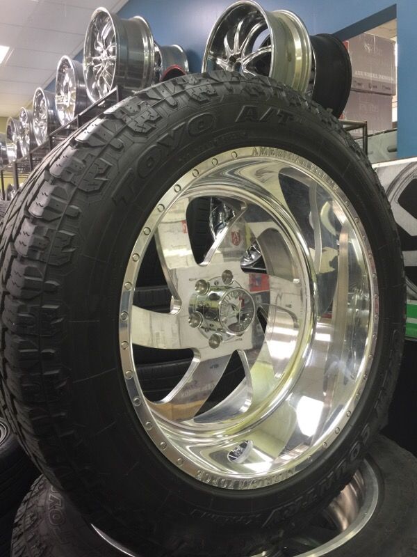 22x12 American force wheels blades with Toyo all terrain 325/50r22
