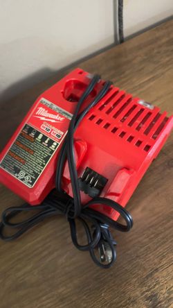 Used good condition Milwaukee M12 and M18 12-Volt/18-Volt Lithium-Ion Multi-Voltage Battery Charger.