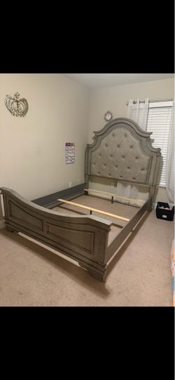 Realyn bed frame with box spring and mattress