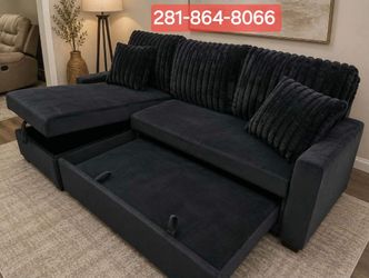 New Black Sectional with pull out bed