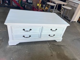 White refurbished coffee table on wheels