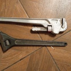 24 Inch Husky  Pipe Wrench     20 Inch Crescent Wrench 