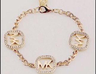 Gold plated Mk bracelet new