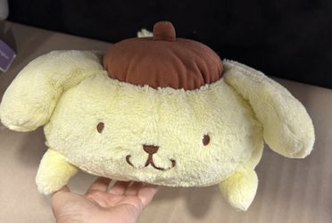 Sanrio Pompompurin plush is a soft, stackable character