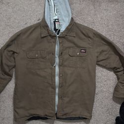 Brown Dickies jacket layered with grey hood 