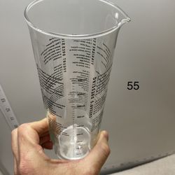 Neat Glass Salad Dressing Mixer.  Five Recipes printed around it. 