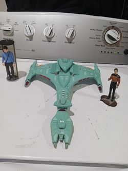 1993 Star Trek Klingon Attack Cruiser  Playmates.. with sounds.  Good Working Condition. and Dr. Leonard and Hamilton action figures. 