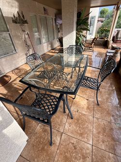 Cast Iron Patio Dining Set with Glass Top