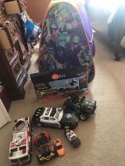 Toys, fire truck,huge police car, toy skate ramps,Turtle tent