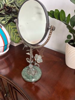 Brass hummingbird vanity mirror