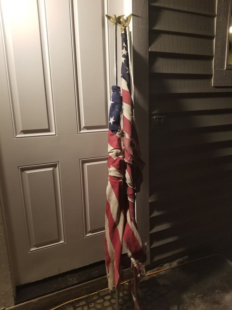 Two Well Loved and Tattered Flags for Retirement
