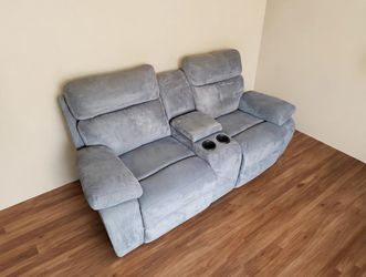 Sky blue Reclining Loveseat with Cupholders + Center Storage