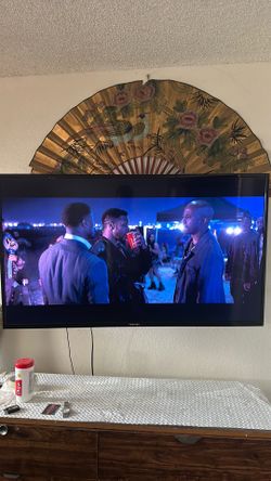 Tv with wall mount included