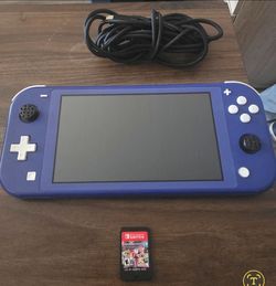 Nintendo Switch lite and Mario cart game.