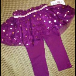 Sz 12 mo Burgandy leggings with attached skirt. No low-ball offers please.