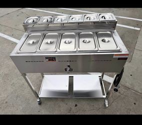 carrito de cinco vaporeras y seis charola para condimento frío