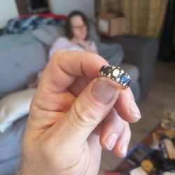 14 Karat Gold Engagement Ring With Five Sapphires And One Diamond