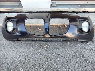 2006-2010 Pontiac Solstice front bumper with fog lights OEM.