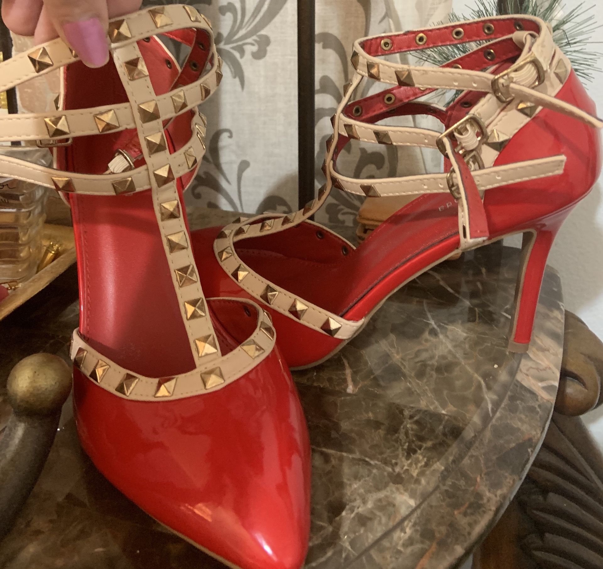 Red studded heels !