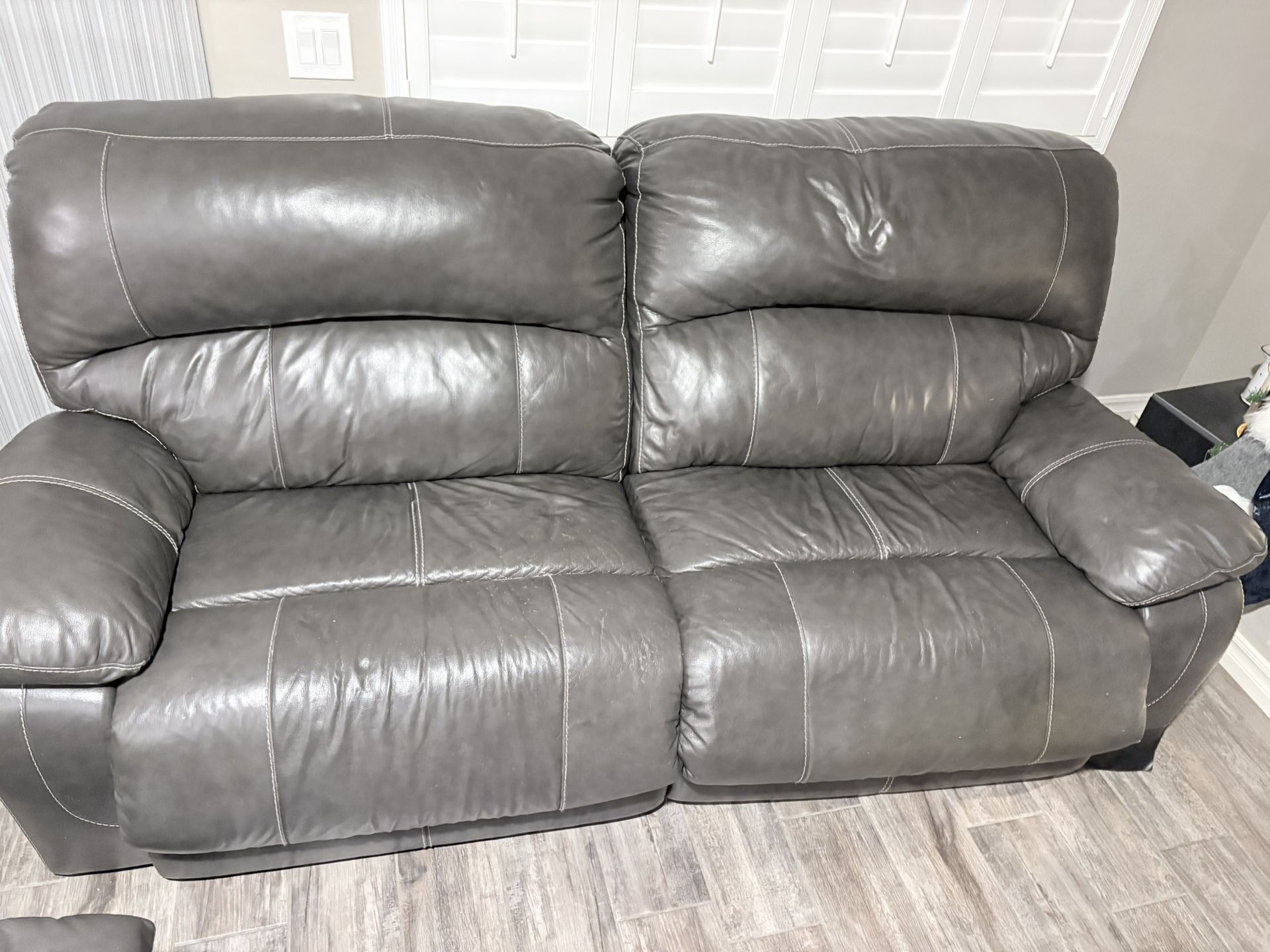 2 Powered Leather Sofas
