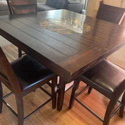 For Sale- Used dining table with  4 chairs 